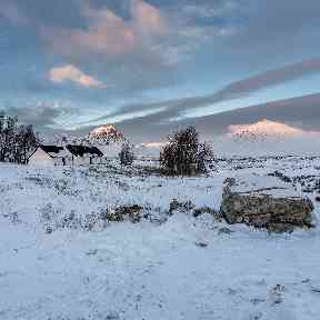 Black Rock Cottage and Stob Dearg dusted in snow near Glencoe.