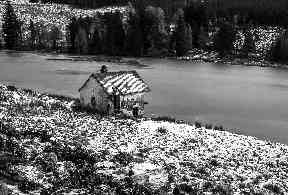 Drumore Loch with an abandoned boat house.