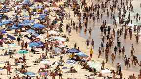 Thousands flocked to Bondi Beach as temperatures soared.