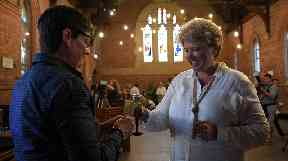 Felicity Evers (left) and Jenny Thompson share a toast after being married in a ceremony in Newcastle, Tuesday, January 9, 2018.