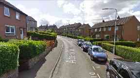 Aberdour Crescent: Woman left lying on road.