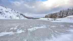 A completely frozen over Loch na Creige by Aberfeldy.