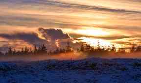 A misty sunset out on the moors.