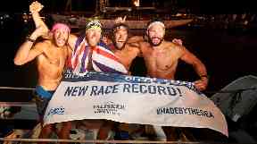 The four are believed to have set a world record in the crossing.