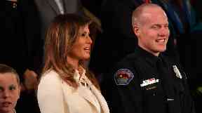 First Lady Melania Trump and Albuquerque policeman Ryan Holet.