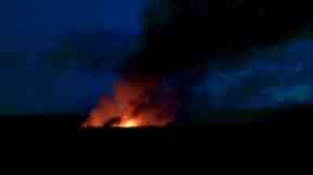 Gu Dar Pyin burns in distance.