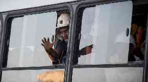 A worker from the Beatrix mine returns to safety.