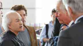 Anh Nhu Nguyen was photographed beside the Prince of Wales when he met survivors.