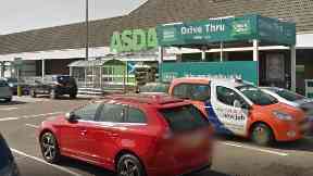 Asda: Man taken to hospital.