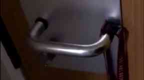 Image taken from Rufaro Chisango's video in which racist abuse can be heard from the other side of the door.