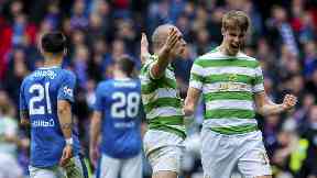 Scott Brown and Kris Ajer celebrate Celtic's equaliser.