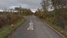 Road: Man was standing in the middle of the street.