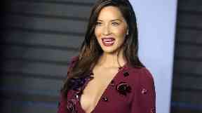 Olivia Munn said that if change is to happen, people need to do more than 'wear a pin'.