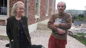 Susie and Esmond Bulmer outside their home in Somerset.
