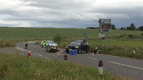 A947: Police close off road while they investigate.