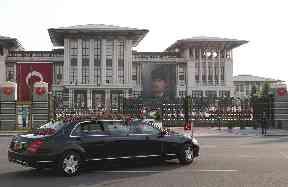 Turkey’s President Recep Tayyip Erdogan is driven to a ceremony at the Presidential Palace
