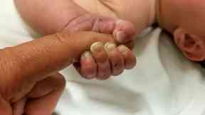 The five-month-old survived around nine hours buried under sticks and debris in the woods