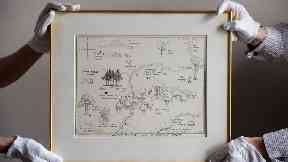 An original illustrated map of Winnie-The-Pooh’s Hundred Acre Wood has sold for a record £430,000.