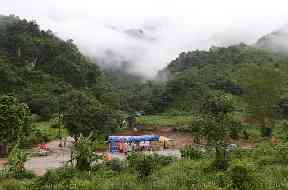 Rescuers at a checkpoint near the entrance of the cave complex.