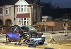 A forensic officer at the scene of the fatal collision in Coventry