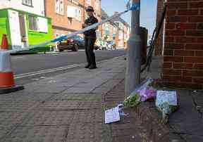 Flowers at the scene in Rollestone Street, Salisbury
