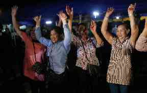 Peoples celebrate after the evacuation of the boys and their coach