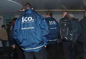 Enforcement officers working for the Information Commissioner’s Office entering the offices of Cambridge Analytica in central London in March