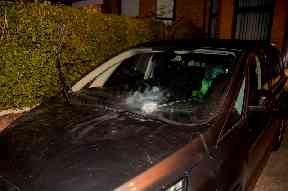 Damage to a car at the scene in West Belfast