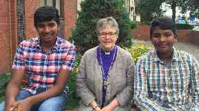 Dedicated: Somer (l) with brother Areeb and Rev Susan Brown.