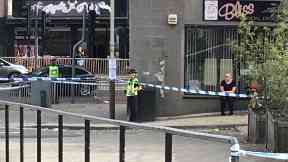 Hilltown: Officers cordoned off several streets.