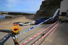 Police tape near the beach at Seaton Garth