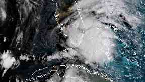 Tropical Storm Gordon appears south of Florida (NOAA via AP)