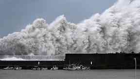 High waves hit breakwaters in Aki.