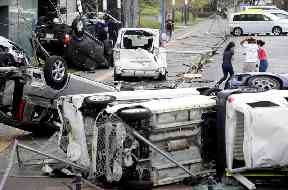 Overturned cars in Osaka