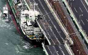 A tanker slammed into the side of a bridge