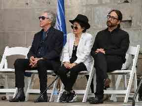 Photographer Bob Gruen, from left, Yoko Ono and Sean Lennon attended the event in New York’s Central Park