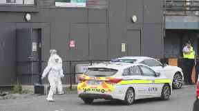 Woman arrested over shooting at boxing club