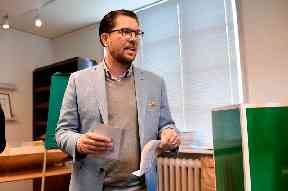 Jimmie Akesson, leader of the right-wing nationalist Sweden Democrats party, prepares to vote in Stockholm.
