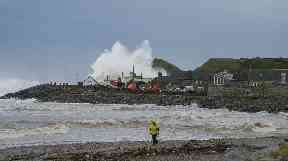 Flood: A wave overtopping during coastal storms at Stonehaven.