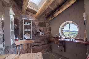 The wooden kitchen surfaces were all handcrafted out of wood by Ian.