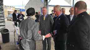 Prince Charles: Visits fish market.