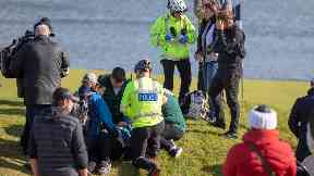 Injured: The woman was treated on the course by paramedics.