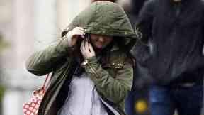 This commuter battled the elements on Friday morning.