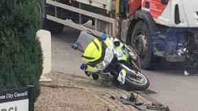 Crash: Roundabout blocked after collision.