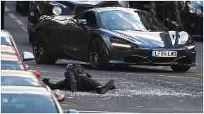 Camera: The actor was seen lying in a pool of broken glass.