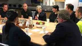 Conversation: Ms May met with factory staff.