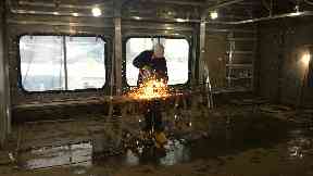 A welder at Ferguson Marine shipyard in Port Glasgow.