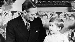 Family: King George VI, pictured with his grandson, Prince Charles.