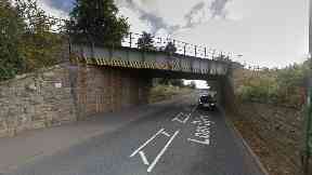 Crash: Hillside railway bridge struck in crash.