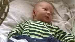 Struggle: Tim suffered from postnatal depression after the birth of his youngest Lewis.